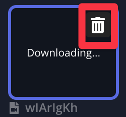 A screenshot of a file uploading in the media library with the text "downloading..." where the image thumbnail should be with a red box around the trashcan icon in the top right corner