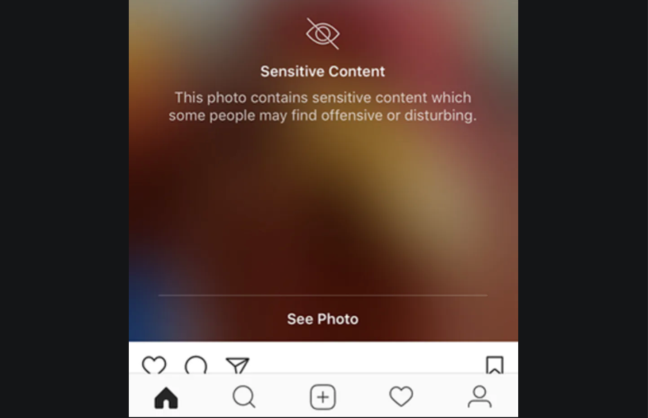 Screenshot of an Instagram post that warns users before viewing sensitive content.
