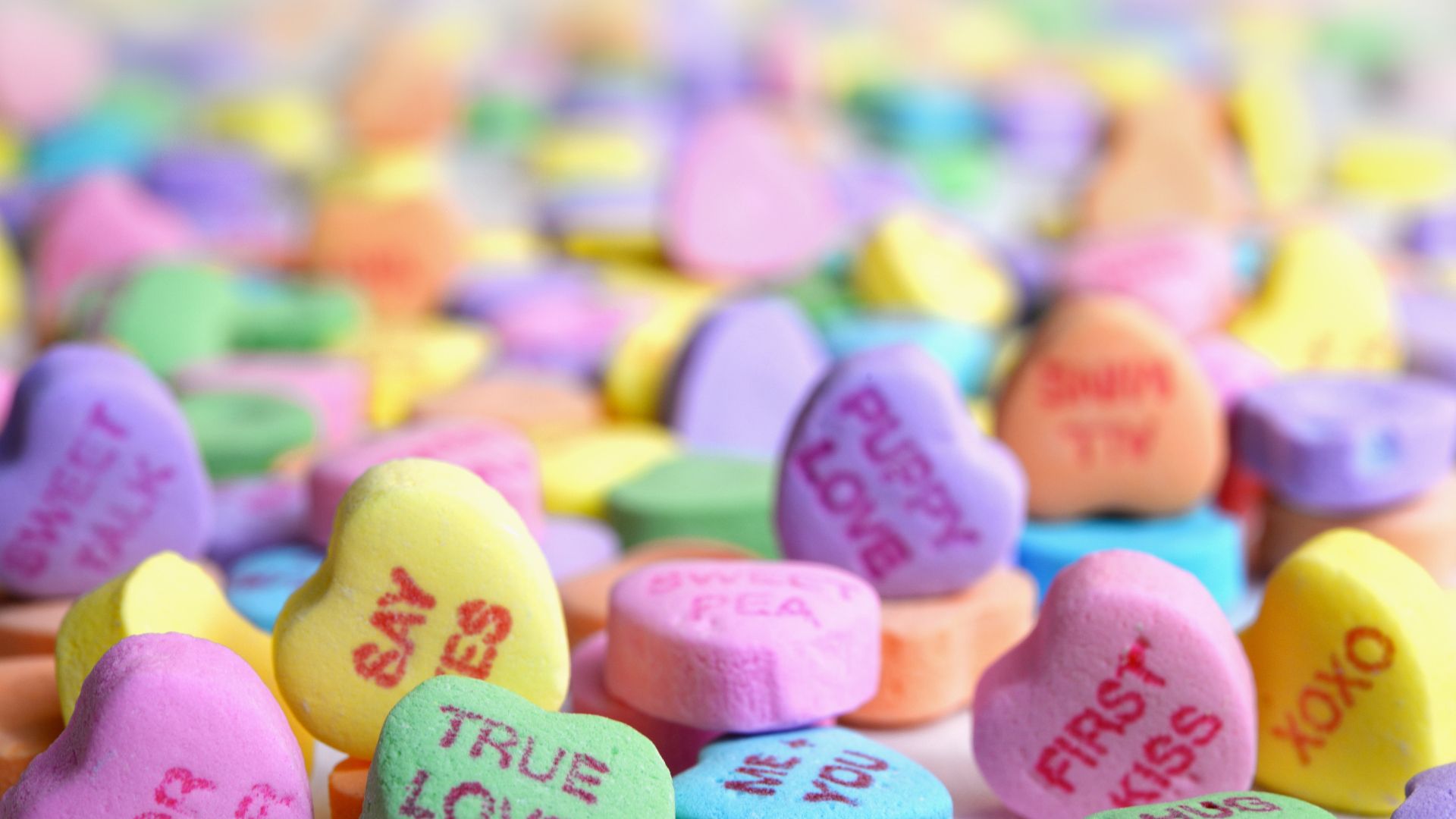 a colorful cluster of candy hearts