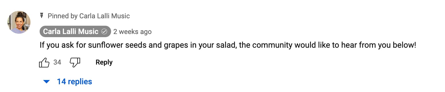 Screenshot of a YouTube comment pinned YouTube creator Carla Lalli Music that reads, "If you ask for sunflower seeds and grapes in your salad, the community would like to hear from you below!" The comment has thirty-four likes and fourteen replies.